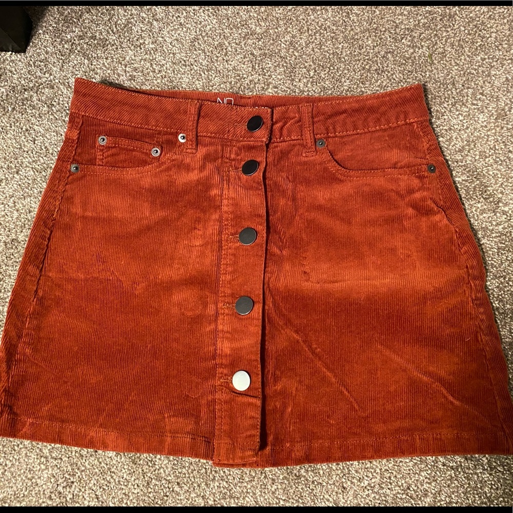 Orange skirt.